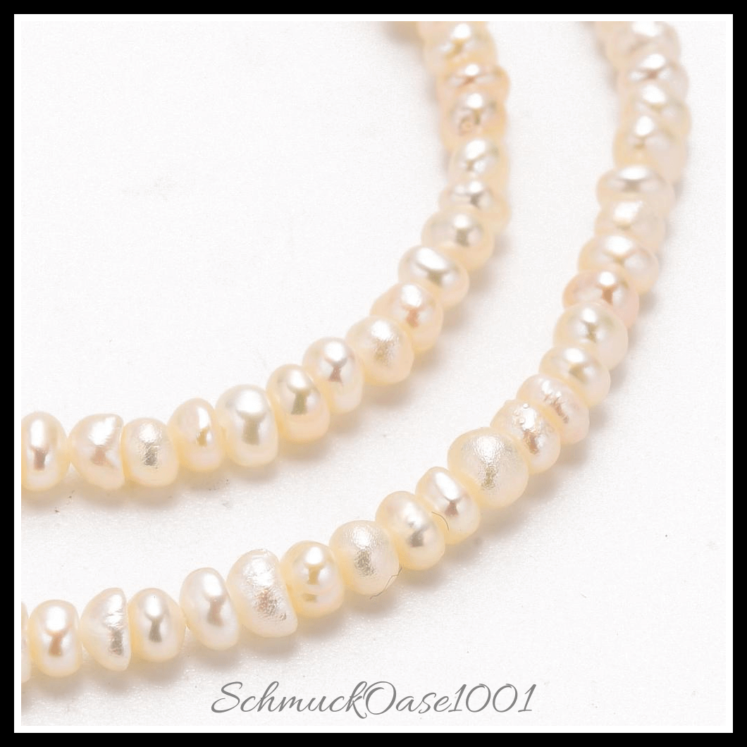 Kultivierte süßwasserperlen stränge – creme-weiß, 2–4 mm (1 strang), aus natürliche süßwasserperlen / zwei seiten poliert in der farbe creme-weiß und größe 2–3 mm, bohrung: 0.8 mm, ca. 190–200 stk./strang