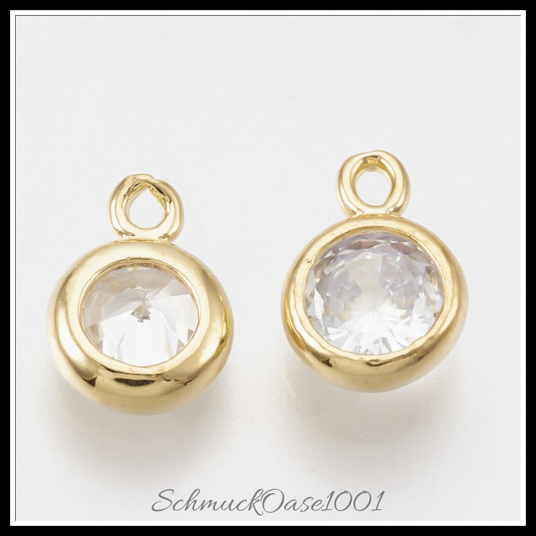 Messing zirkonia charms – flachrund / 8.5x6x2.5 mm / 4 stück, aus messing / zirkonia, facettiert, 18k vergoldet in der farbe transparent und größe 8.5x6x2.5 mm, loch: 1.2 mm / 4 st.