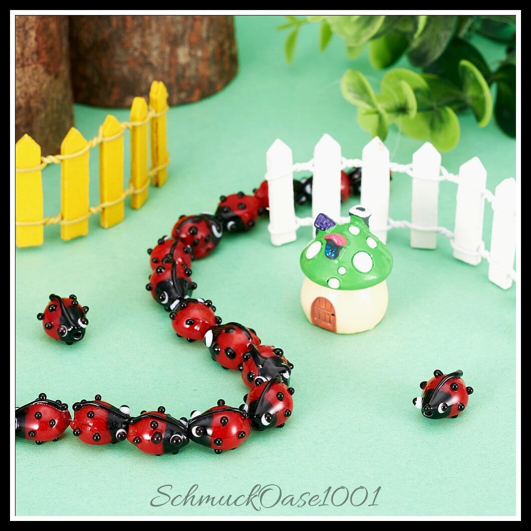 Handgemachte lampwork perlen – marienkäfer / 12–14x9–10x5–6 mm / 1 strang, aus lampwork / handgemacht, marienkäfer in der farbe rot und größe 12–14x9–10x5–6 mm, loch: 1–2 mm / 1 strang, ausdrucksstark und ideal für auffällige designs