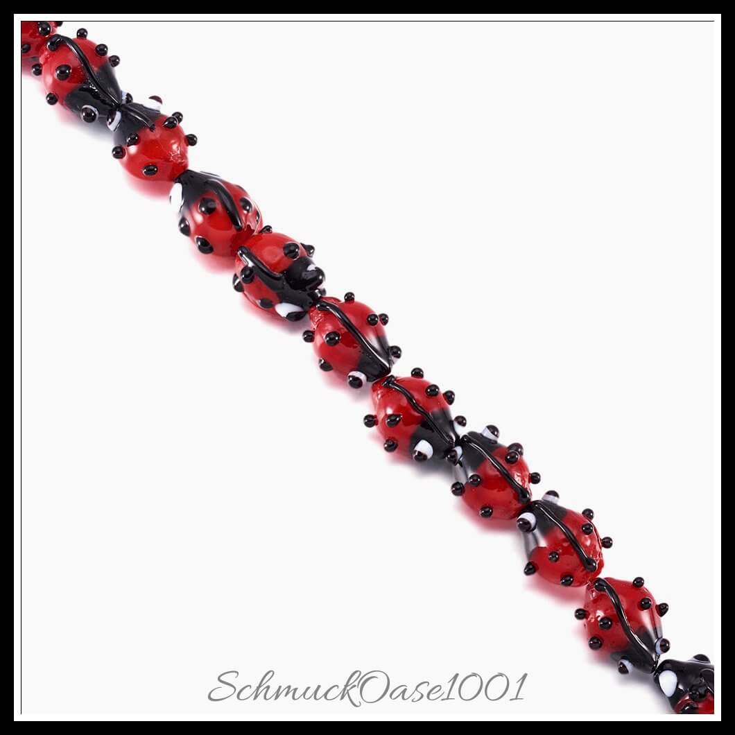Handgemachte lampwork perlen – marienkäfer / 12–14x9–10x5–6 mm / 1 strang, aus lampwork / handgemacht, marienkäfer in der farbe rot und größe 12–14x9–10x5–6 mm, loch: 1–2 mm / 1 strang, ausdrucksstark und ideal für auffällige designs