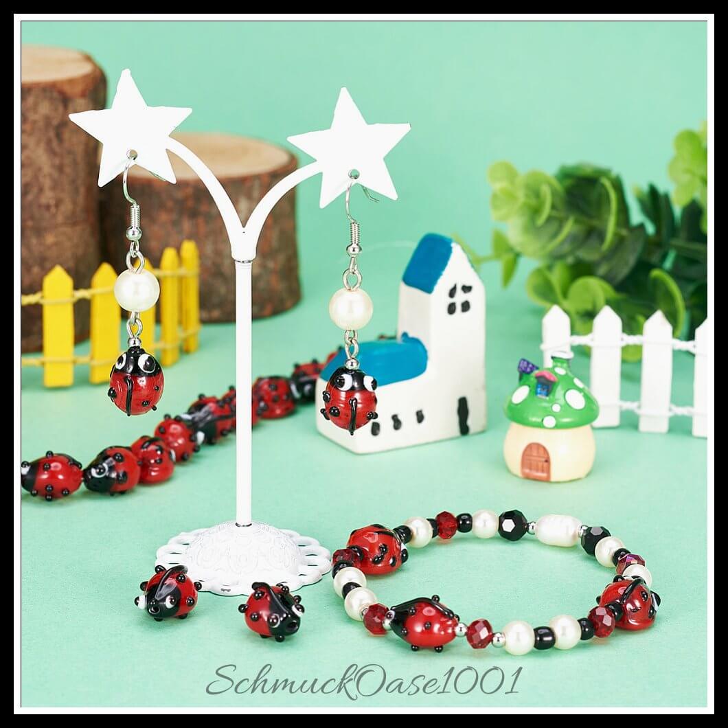Handgemachte lampwork perlen – marienkäfer / 12–14x9–10x5–6 mm / 1 strang, aus lampwork / handgemacht, marienkäfer in der farbe rot und größe 12–14x9–10x5–6 mm, loch: 1–2 mm / 1 strang, ausdrucksstark und ideal für auffällige designs