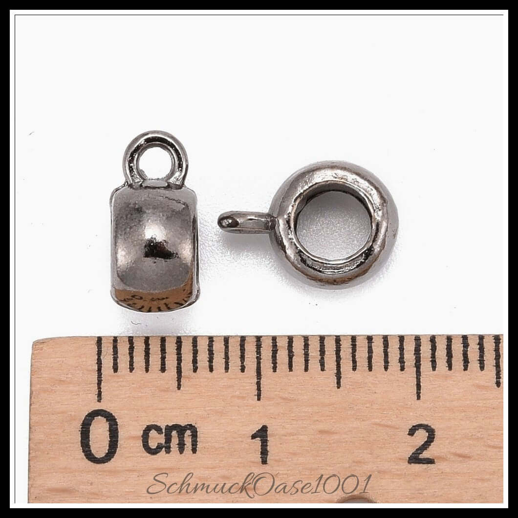 Tibetische bail beads – barrel / 11.5x8x5.5 mm / 16 stück, aus legierung / tibetisch, barrel, cadmiumfrei, nickelfrei, bleifrei in der farbe gunmetal und größe 11.5x8x5.5 mm, innendurchmesser: 4.8 mm, loch: 2 mm / 16 st.