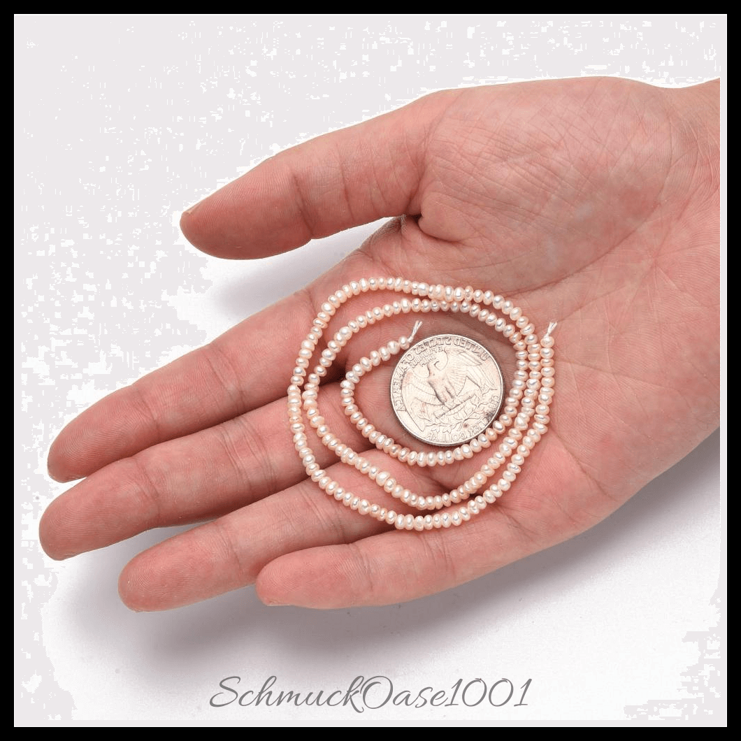 Kultivierte süßwasserperlen stränge – creme-weiß, 2–4 mm (1 strang), aus natürliche süßwasserperlen / zwei seiten poliert in der farbe creme-weiß und größe 2–3 mm, bohrung: 0.8 mm, ca. 190–200 stk./strang