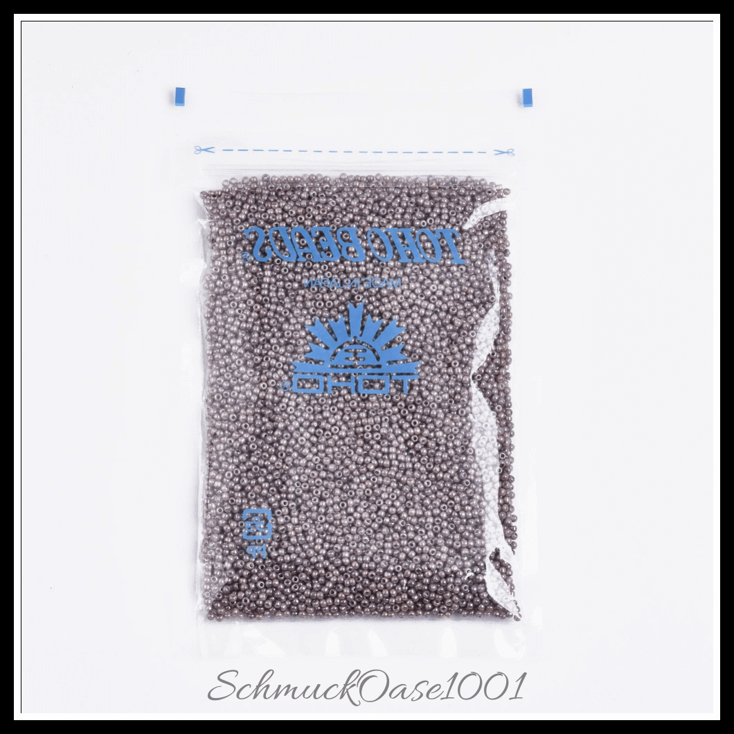 Toho runde rocailles – 11/0 – japanische rocailles – (1203) undurchsichtig – taupefarbener kakao – marmoriert – 20g, aus taupefarbener kakao in der farbe glas, toho, rund, 11/0, marmoriert und größe 11/0 2x1.5 mm, loch: 0.7 mm; 20 gramm