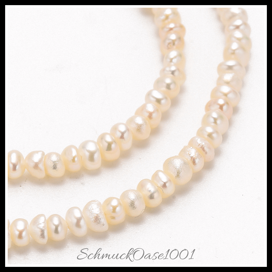 Kultivierte süßwasserperlen stränge – creme-weiß, 2–4 mm (1 strang), aus natürliche süßwasserperlen / zwei seiten poliert in der farbe creme-weiß und größe 2–3 mm, bohrung: 0.8 mm, ca. 190–200 stk./strang