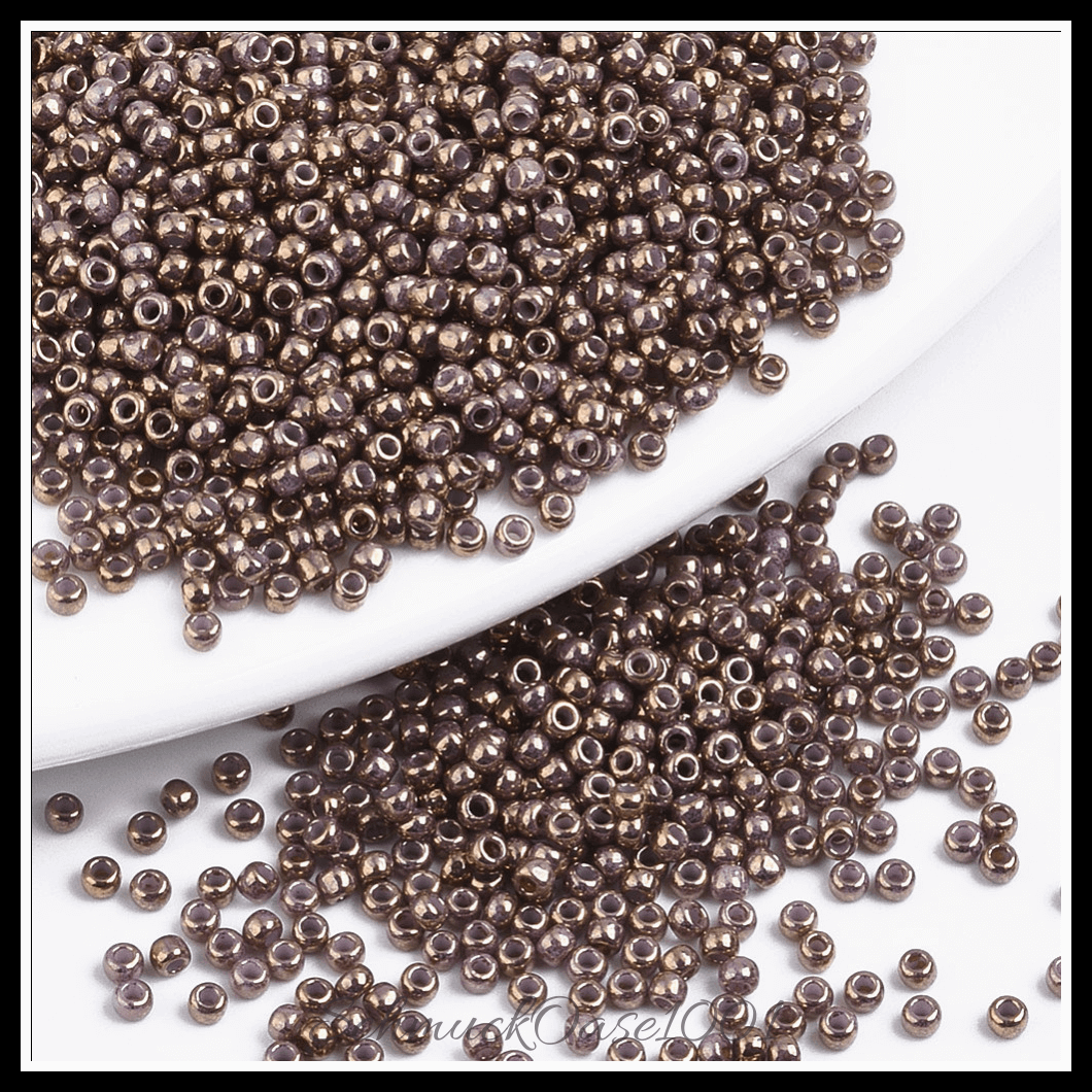 Toho runde rocailles – 11/0 – japanische rocailles – (1706) vergoldet – marmor schwarz – 20g, aus marmor schwarz in der farbe glas, toho, rund, 11/0, vergoldet, marmoriert und größe 11/0 2x1.5 mm, loch: 0.5 mm; 20 gramm