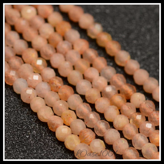 Natürliche sunstone perlen – facettiert, rund, 2 mm, 2 stränge in den farben natuerlicher sunstone, facettiert, rund, ausdrucksstark und ideal für auffällige designs