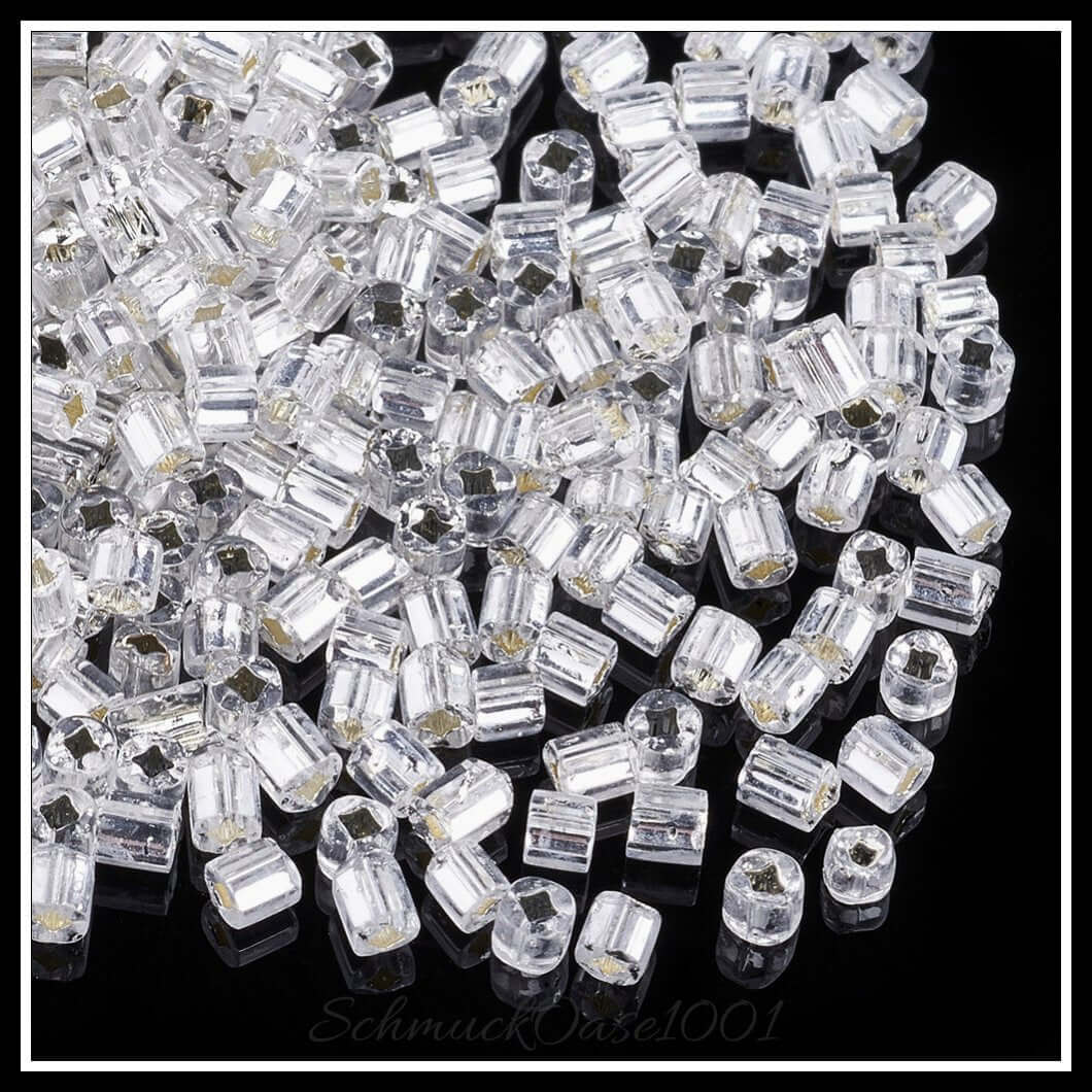 Glasperlkornperlen – silber ausgekleidet – quadratisches loch / 2–2.5 mm / 50 g, aus glas / silber ausgekleidet, quadratisches loch in der farbe rauch weiss und größe 2–2.5x2.5 mm, loch: 0.8 mm / 50 g