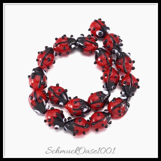 Handgemachte lampwork perlen – marienkäfer / 12–14x9–10x5–6 mm / 1 strang, in der farbe rot, ausdrucksstark und ideal für auffällige designs