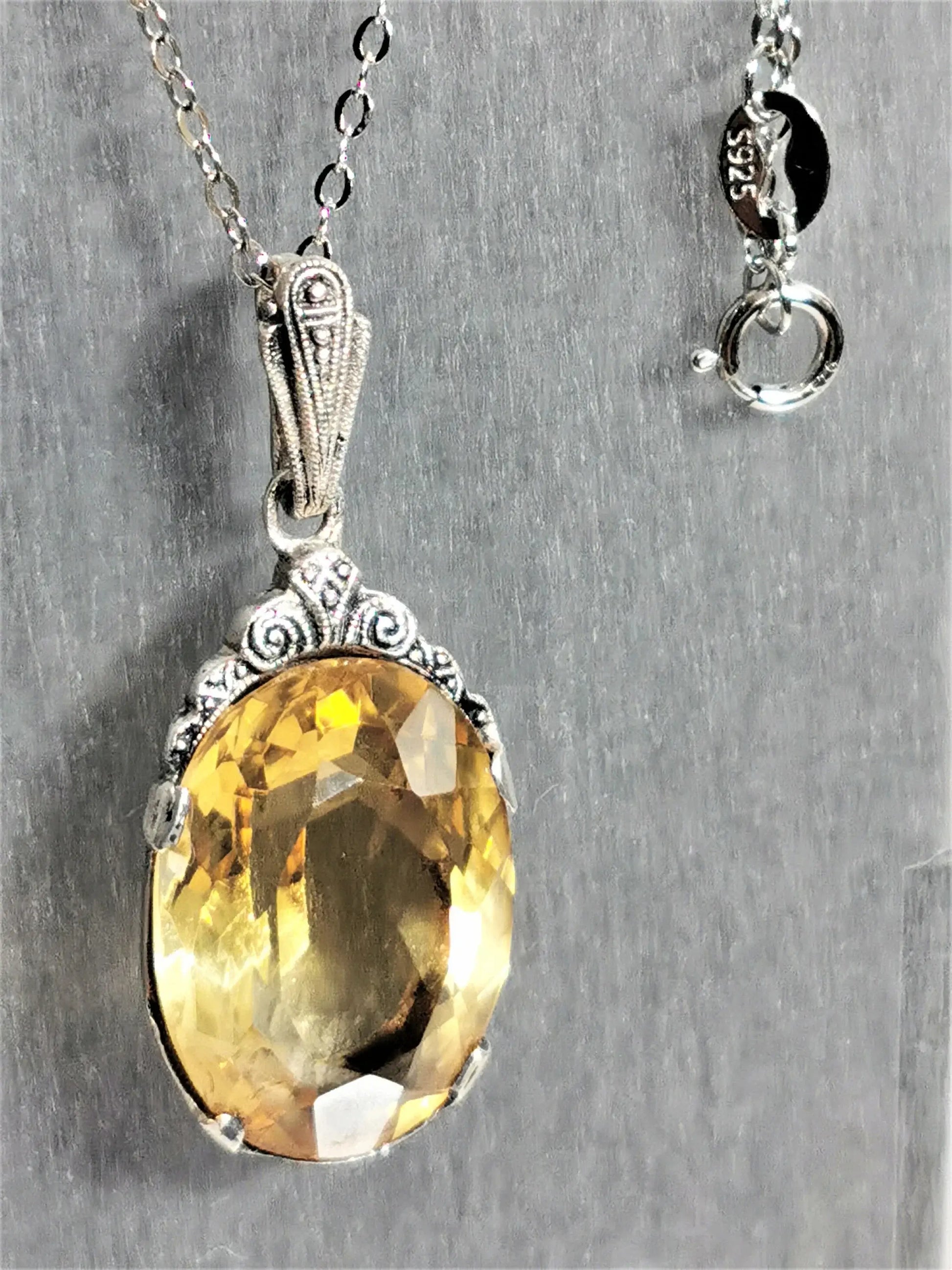 Citrin-anhänger im jugendstil – eleganz aus 835er silber und goldenem glanz, zusätzliches detailbild